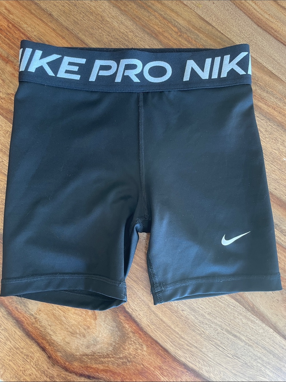 Nike Black Compression Shorts with White Swoosh